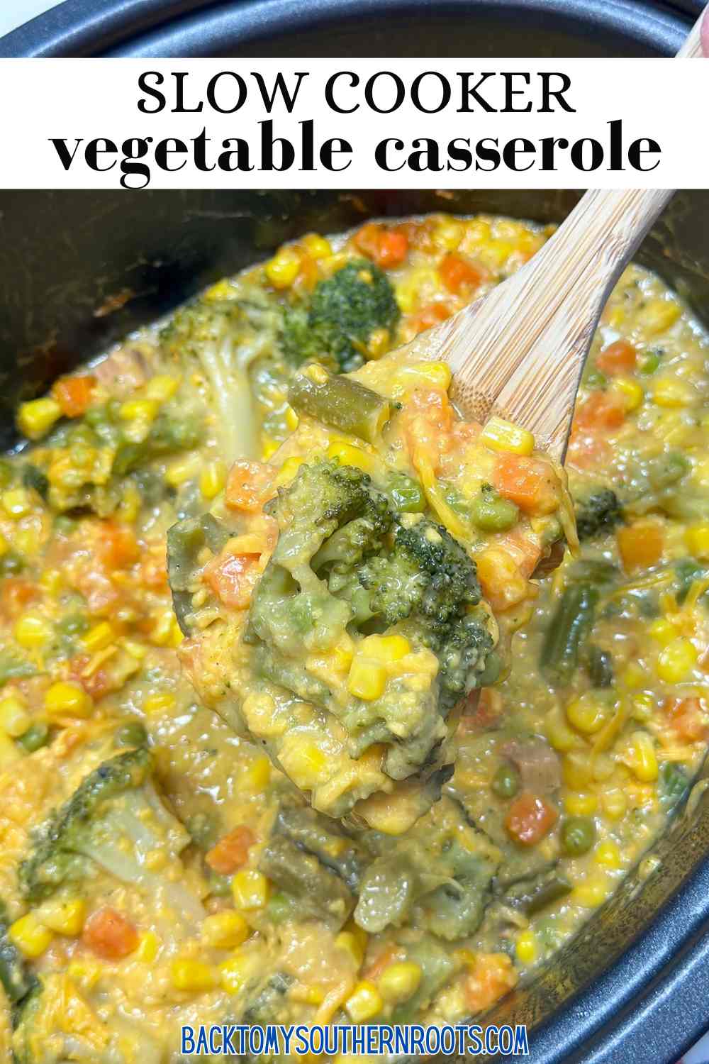 Slow cooker vegetable casserole served in a bowl with colorful vegetables