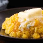 Butter melting on top of cornbread.