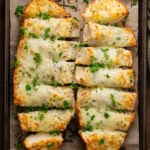 Mozzarella bread on a cookie sheet