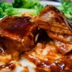 slow cooker bbq pork chops on a plate.