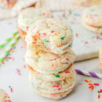 Funfetti whoopie pie cookies stacked on top of each other.