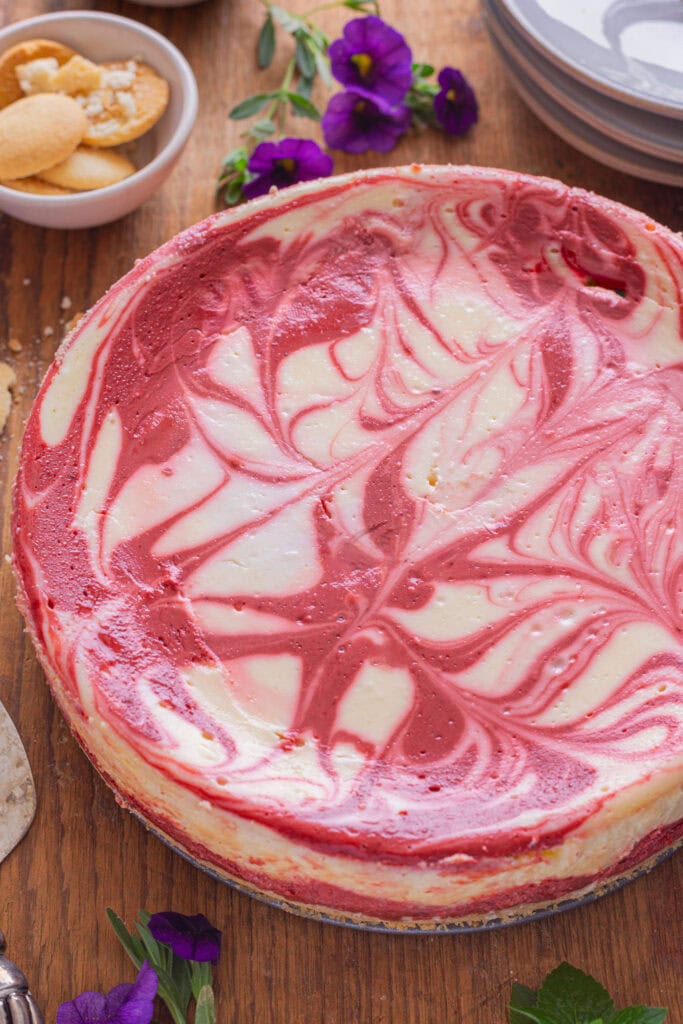 Red velvet cheesecake on a counter. 