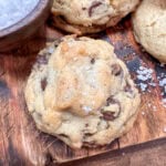 Chocolate chip cookies on a cutting board.
