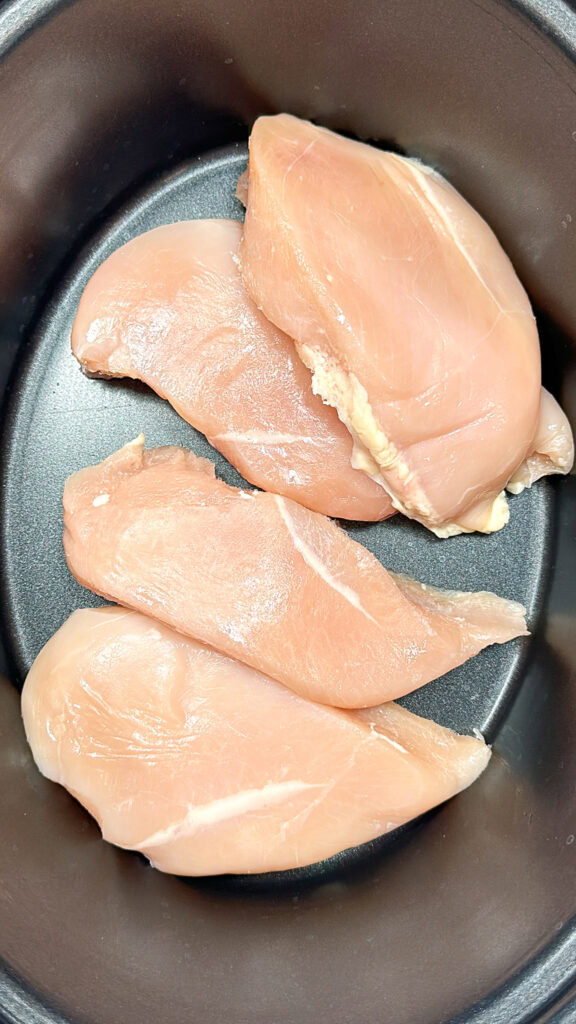 Chicken breasts in the bottom of a crock pot