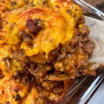 Sloppy joe casserole on a wooden spoon.