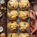 Blueberry muffins in a muffin tin.