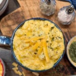 Crock Pot Cheesy French Onion Potatoes in a blue bowl.