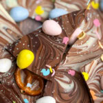 Easter candy on top of chocolate bars, broken into pieces.