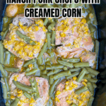 Four pork chops cooked in a crock pot with green beans and creamed corn, topped with ranch seasoning. Text on image reads: Ranch Crock Pot Pork Chops with Corn. Get The Recipe! backtomysouthernroots.com.