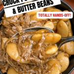 A bowl filled with shredded pork butt and large butter beans in a rich sauce. A spoon is scooping some of the food. Bold text on the image reads Crock Pot Pork Butt & Butter Beans, Totally hands-off! and Only 6 ingredients!.