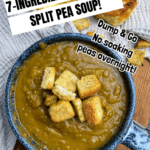 A bowl of 7-Ingredient Crock Pot Split Pea Soup with Ham topped with croutons sits on a blue plate, accompanied by a biscuit on the side. Text promotes an easy split pea soup recipe that requires no soaking.